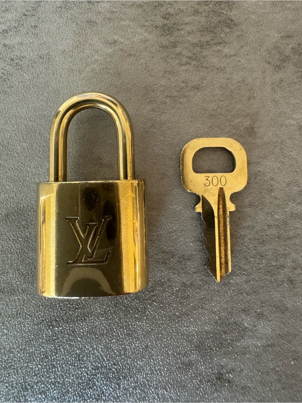 Louis Vuitton Gold-Tone Padlock and Key Set #300